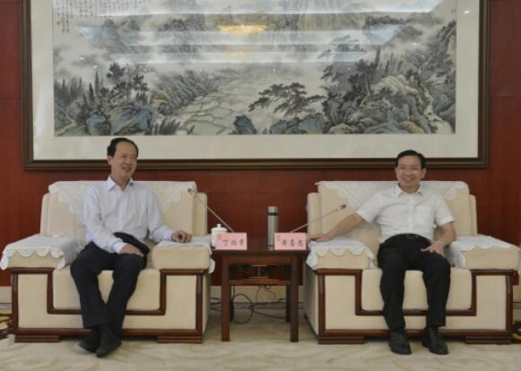 丁焰章拜會南昌市委副書記、市長黃喜忠