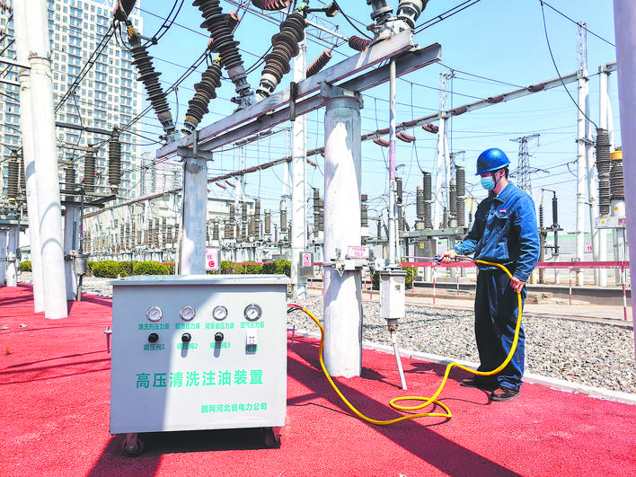 國網(wǎng)邯鄲供電公司：帶電清洗注油裝置 讓隔離開關(guān)清洗高效又便捷