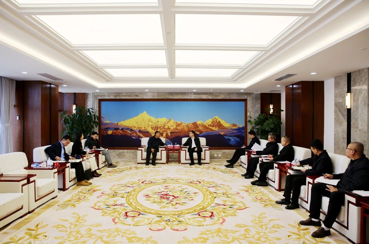 王繼才與昆明市發(fā)改委副主任、市能源局局長施云懷會談